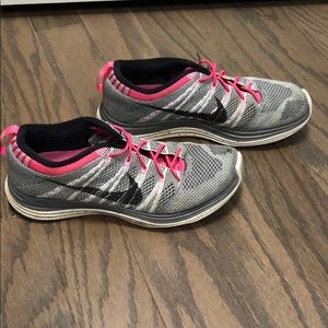 Nike Flyknit One. Black, white, and hot pink! 7